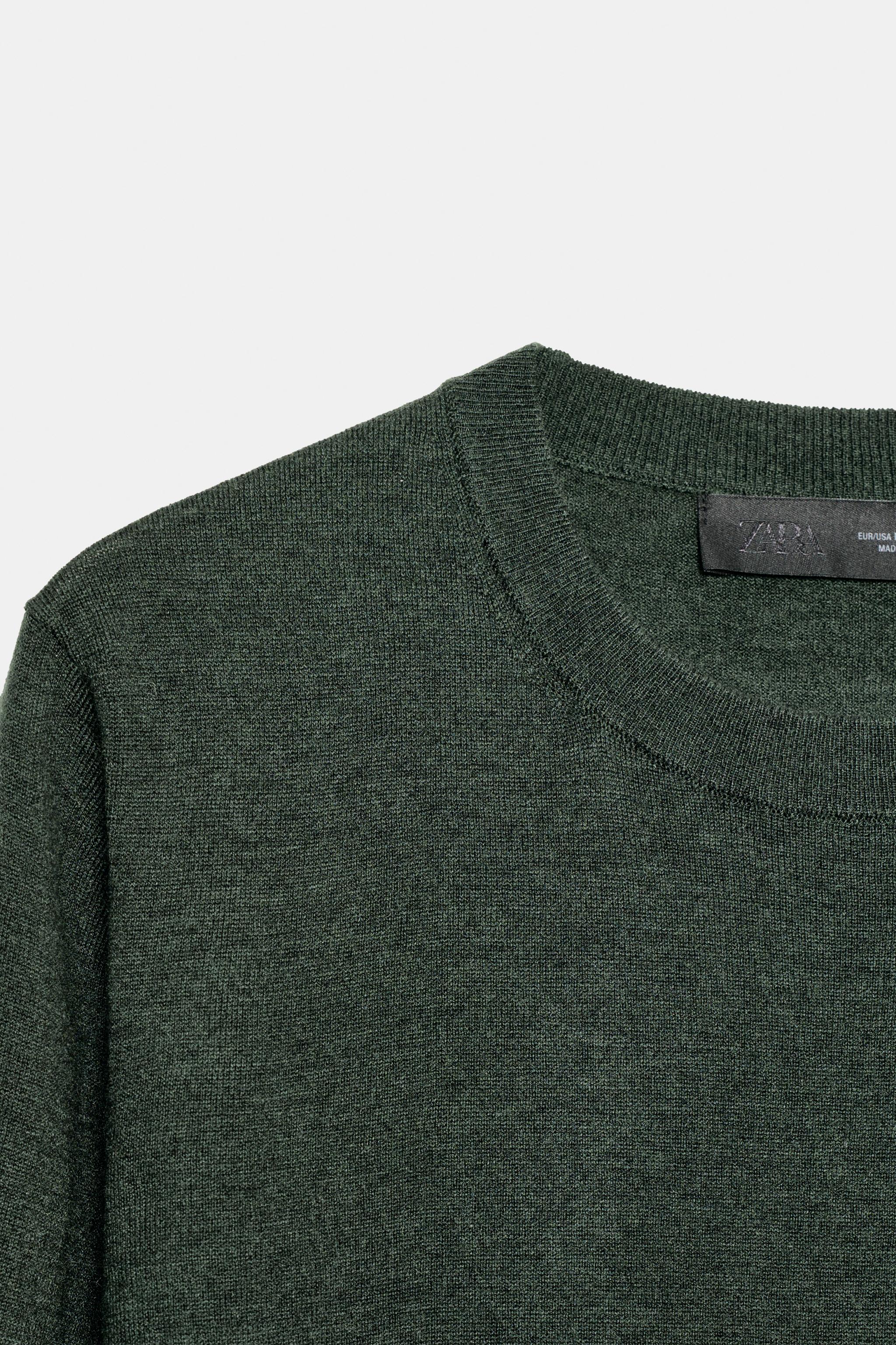 SHORT SLEEVE WOOL SWEATER